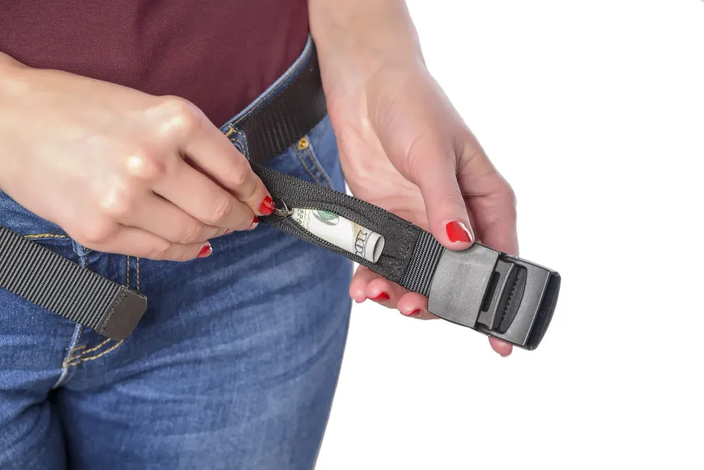 Money in a secret pocket of the belt.